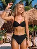 Artículo popular de comercio exterior 2026: Bikini de dos piezas de color liso de alta gama con nudo retorcido, tirantes finos, push-up y diseño de cordón para mujer