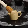 Mango de tetera de punta de dedo pieza de arena púrpura tetera pequeña olla de punta de dedo juego de té de kung fu té exquisito para los dedos mesa de té mini