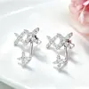 Brincos Europeus e Americanos Cruzados de Estrela de Quatro Pontas com Tarraxas de Prata S925, Design de Cruz Dupla, Luxo Leve, Estrela Radiante Cravejada de Diamantes, Brincos Únicos, Simples e Requintados