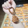 Peonza de madera de azufaifo, cadena para teléfono móvil, colgante de bolsa para peonza, llavero, correa colgante anti-pérdida de gran venta