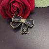 Broches al por mayor: Broche de Lazo Estilo Nuevo Chanel, Pin Sencillo y Elegante para Traje, Accesorio de Doble C para Mujer
