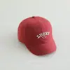 Bordado de letras de dibujos animados para niños, cara sonriente, corto a lo largo de la gorra de béisbol, versión coreana de todo a juego para niños y niñas, bebé, gorra de béisbol para exteriores, venta al por mayor