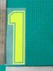 Camisa de time adulto verde com estampa de números e letras, modelo Frame Green B Goods, com transferência térmica para mapas e suprimentos para camisas de time.