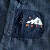 Camisa vaquera para niños, colección otoño 2026, camisa de trabajo estilo japonés con estampado de dibujos animados y cremallera, prenda exterior elegante y casual para bebés y niños pequeños