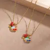 Collar Myya de Acero Inoxidable y Acero de Titanio Europeo y Americano Colgante de Pez Tropical con Aceite Gotas Joyería Linda de Nicho No se Desvanece