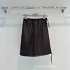 En stock Set de Chaqueta con Cremallera y Falda PD Triangle Shenzhen Nanyou, Juvenil y Versátil, Nuevo Producto Otoño/Invierno para Ventas Transfronterizas