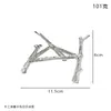 Base triangular transparente de cristal en forma de rama de árbol, un regalo para un adorno de mesa de sala de estar de lujo ligero o soporte para muñecas