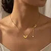 Collar minimalista de moda transfronterizo, cara sonriente chapada en oro, versátil para el uso diario y como regalo, con un pequeño colgante de ladrillo de oro en forma de lágrima