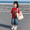 Conjunto de Verano para Niñas de Manga Corta 2026 Nuevo Estilo Coreano Moda Camiseta y Shorts de Mezclilla Conjunto de Dos Piezas para Niños Mayores