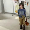 Outono 2026 Huzhou Zhili Roupa Infantil Estilo Coreano Primavera Algodão Lavado Calça de Trabalho Calças Meninas Meninos 7560