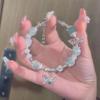 Pulsera de lujo con diseño de nicho de cuentas esmaltadas con degradado de palomitas de maíz y mariposas de alta calidad.
