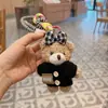 Nuevo Suéter de Dibujos Animados con Lazo Oso Llavero de Coche Muñeco de Peluche Creativo Colgante Decorativo para Bolso Niña