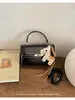 Bolsa Pequena Texturizada Elegante de Alta Qualidade para Mulheres 2026 Nova Moda Versátil Bolsa Transversal Exquisita Super na Moda Bolsa Quadrada Pequena