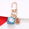 Estilo Chino Atrae Fortuna Cerámica Gato de la Suerte Llavero Colgante Estuche para Auriculares Bolso Encanto Accesorio Adornos Pequeños Venta al por Mayor
