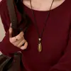 Collar con colgante ovalado de cordón de cuero minimalista estilo coreano, diseño de nicho de moda, cadena versátil para suéter para ir al trabajo