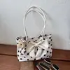 Nueva colección otoño e invierno 2026: bolsa de mano de cuero y terciopelo, bolso de hombro, con detalle de lazo, bolso versátil, diseño de lunares, estilo casual