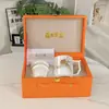 Taza de Café de Conferencia Estilo Chino Ouge de Porcelana Hueso Taza de Té de Oficina con Filtro Separación de Agua y Té Caja de Regalo de Alta Gama