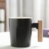 Suministro de fábrica taza de cerámica creativa con asa de madera taza de cerámica con asa taza LOGO personalizado