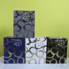 Bolsa de Regalo Tote Circular de Cartón Blanco en Stock Círculo Estampado en Caliente Papel de Compras Empaque de Ropa Bolsa de Regalo