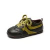 Otoño 2026 Nuevo Moda Infantil Versátil Ligero Suela Blanda Zapatos de Entrenamiento Alemanes Tenis Casuales de Bloques de Color Zapatos Planos