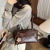 Bolsa de Axila Feminina 2026 Nova Tendência Outono High-End Vintage para o Dia a Dia Bolsa de Ombro Fashion Versátil Bolsa de Mão