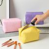 Bolsa de cosméticos de viaje pastel PU bolsa de almacenamiento de gran capacidad al por mayor bolsa de almacenamiento de viaje bolsa de aseo Macaron simple