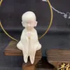 Fruta de marfil tallado gratis Guanyin Buda adornos decoración sala de estar hogar fabricantes de artesanías al por mayor