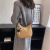 Bolso pequeño de comercio exterior transfronterizo para mujer, estilo coreano, de alta gama, estilo retro, sencillo y popular.