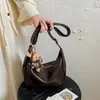 Bolsa transversal feminina 2026 novo estilo moderna alta qualidade vintage bolsa de ombro única feminina grande capacidade para trabalho bolsa bolinho