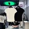 Elegante camiseta negra de cuello redondo, hombros normales, manga corta para mujer, nuevo modelo verano 2026, única, súper elegante, top estilizado