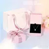 Caja de joyería con lazo, flor de rosa, paño de pulido de plata, certificado, bolso de mano, collar, pulsera, anillo, pendientes (no se vende individualmente)