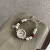 Reloj Nuevo Estudiante Femenina Reloj de Cuarzo Venta al por Mayor Estilo Dulce Ins Pulsera Tejida con Cuentas de Estrella Reloj Reloj Especial para Examen