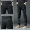 Pantalones Casuales de Hombre de Alta Gama Hong Kong 2026 Estilo Coreano Rectos Ajustados Versátiles Elásticos para Otoño