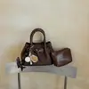 Bolsa tote pequena de alta qualidade, nicho e tendência para o trabalho, coleção outono 2026 nova para mulheres, bolsa de ombro e transversal tipo balde