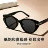 Nuevas gafas de sol europeas y americanas de ojo de gato transfronterizas, a la moda y sencillas, adecuadas para sesiones de fotos, gafas de sol de montura pequeña con un toque de alta gama, venta al por mayor