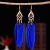 Gran oferta de pendientes de plumas vintage de estilo étnico, largos y multicolores, con diseño de cuentas y círculos.