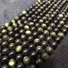 Famosas cuentas de obsidiana dorada natural de cristal accesorios para joyería DIY ojos 8A piedra Yao plateada productos semiacabados al por mayor