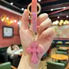 Llavero de cruz con incrustaciones de diamantes de arcilla blanda transfronterizo de Amazon, diseño lindo para bolsos y colgantes de llaves de coche
