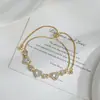 Joyería de Mano de Lujo Ligero con Circonita Chapada en Oro Real para Mujer Geométrico de Alta Gama Cubo de Azúcar Pulsera Ajustable con Cordón Pulsera con Forma de Corazón
