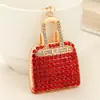 Estilo de Moda de Lujo Ligero Europeo y Americano Mini Bolso de Mano Completamente Cubierto de Diamantes Colgante para Llavero Diseño de Nicho Accesorio para Bolso de Mujer