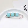Broche de cintura transfronterizo, broche de perlas, pasador para fijar la línea de la cintura de la ropa, herramienta para ceñir la cintura, hebilla de cierre para la cintura anti-exposición