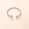 Anillos apilables de acero inoxidable transfronterizos nuevos, cuentas redondas, anillos abiertos de flor de cáñamo finos, fabricantes de joyería de mano de acero de titanio moderna y simple