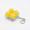 Chaveiro Botão Luminoso de Patinha de Gato Chave de Teclado Switch Tecla de Teclado Brinquedo Descompressão Pingente de Bolsa Chaveiro