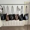 Bolso de Textura Transfronteriza de Gran Capacidad para Mujer Nuevo Estilo 2026 Moda para Viajar y Trabajar Bolso de Hombro Único y de Mano Bolso Tote Casual de Moda