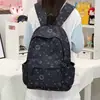 Mochila para estudiantes universitarias versátil estilo japonés ins estudiantes de preparatoria secundaria estudiantes de secundaria estrellas mochila de doble hombro mochila para estudiantes de secundaria mochila escolar