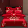 Juego de ropa de cama de lujo estilo chino, hecho de algodón 100% de fibra larga, un juego de cuatro piezas que incluye una sábana y una funda de edredón de algodón puro rojo, perfecto para la alcoba de una recién casada.