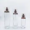 Nuevo juego de botellas de vidrio de fondo grueso cuadradas, tapa de bayoneta, cuerpo de botella, material de embalaje cosmético para loción, cabeza de bomba electrochapada, botella de esencia de 40 ml