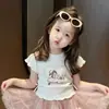 Conjunto de Falda Plisada de Verano para Niñas 2026 Nuevo Infantil Dulce Estampado Manga Corta + Falda de Malla con Lazo