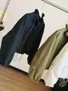 Elegante chaqueta de manga larga con cuello alto y cierre de cremallera para mujer, nueva colección de otoño, corte holgado, versátil, rejuvenecedora y elegante, con cordón y longitud corta.