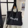 Bolsa Tote Grande Capacidade Estilo Coreano Estilo Ins Personalidade Simples Bolsa de Ombro Única Carta Outono 2026 Nova Bolsa para Deslocamento Preguiçoso